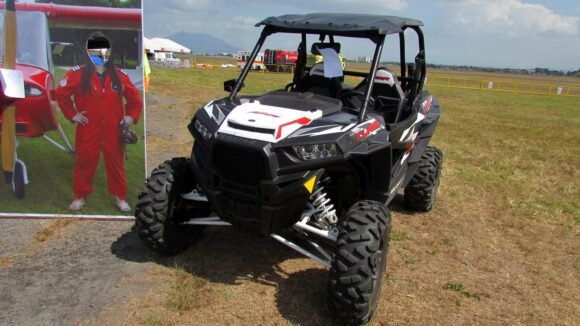 Polaris RZR side by side UTV parked at an outdoor event
