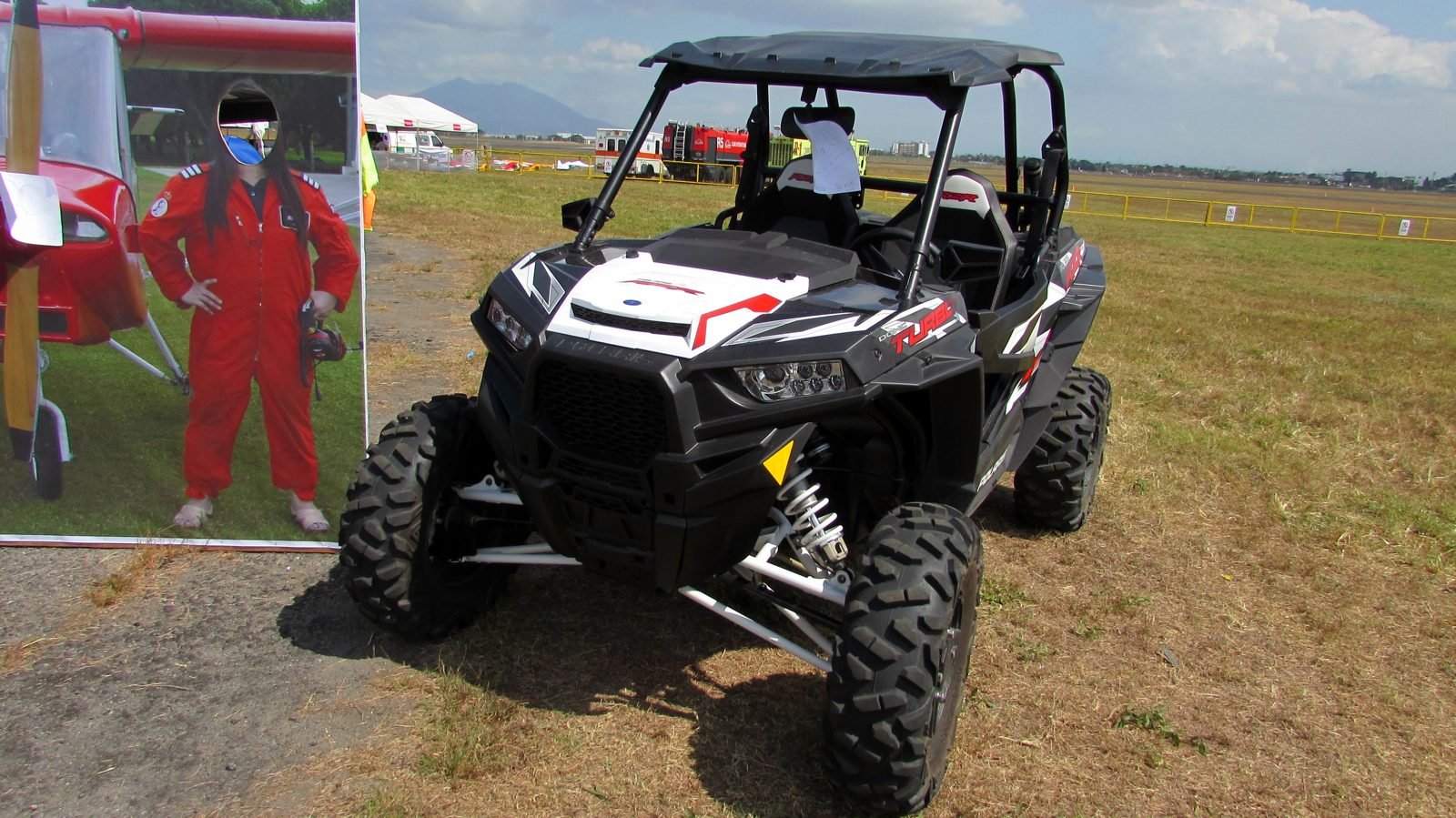 Polaris RZR side by side UTV parked at an outdoor event