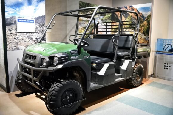 A Kawasaki Mule Pro-DXT utility UTV, same manufacturer family as the Kawasaki Teryx