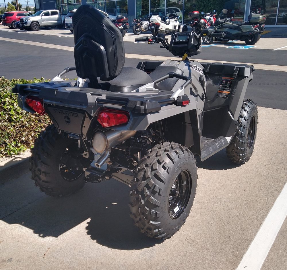Polaris Sportsman 570 utility ATV on a dealership lot